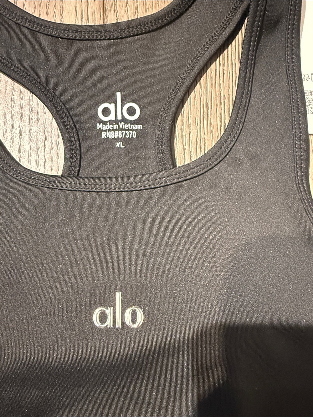 ALO Yoga Black Racerback Sports Bra with White Logo - Picture 2 of 5